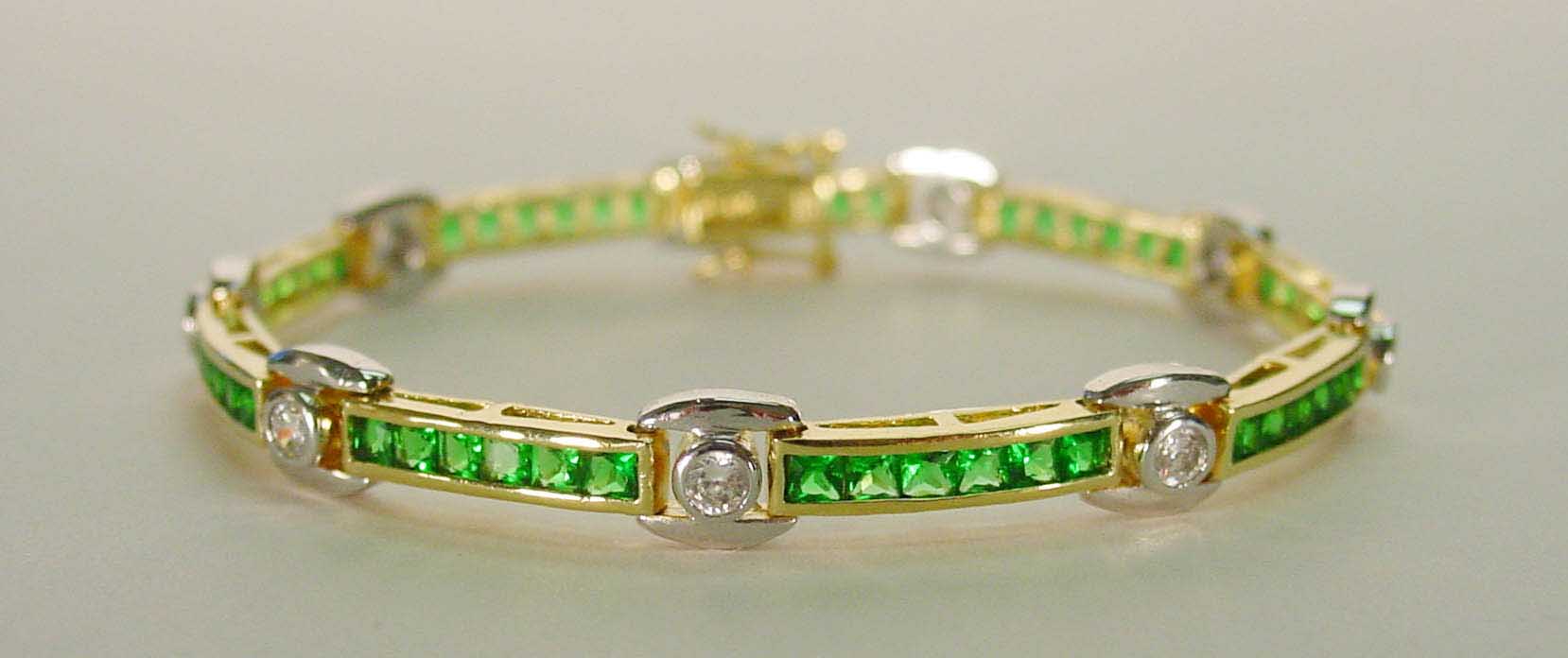 Emerald CZ & clear CZ two-tone bracelet