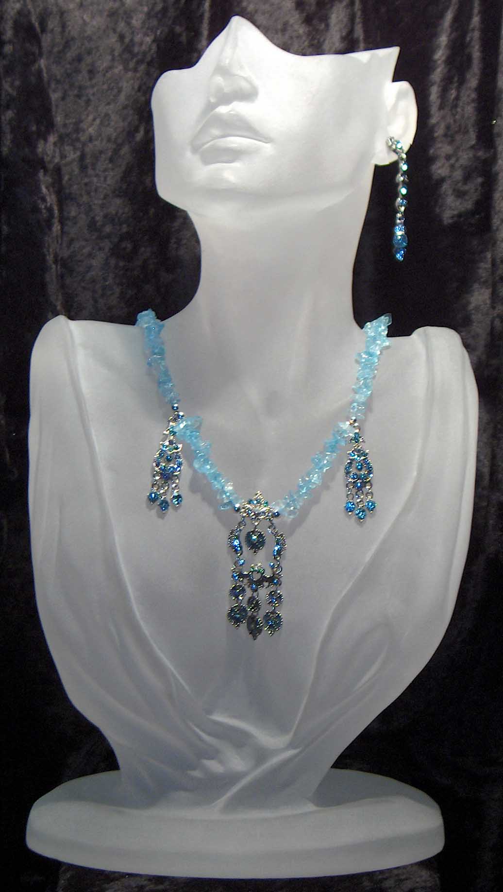 Blue topaz chips with hanging blue crystal pendants